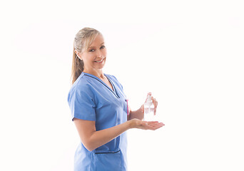 Image showing Nurse or healthcare professional demonstrating hand sanitizer