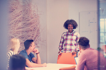 Image showing Multiethnic startup business team on meeting