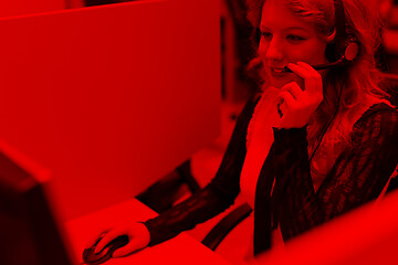 Image showing female call centre operator doing her job