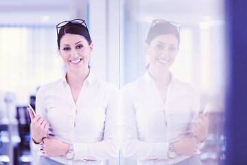 Image showing Business Woman Using Digital Tablet in front of startup Office