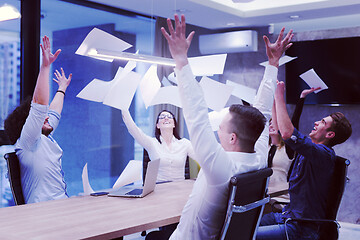 Image showing startup Group of young business people throwing documents