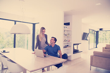 Image showing couple using laptop at home