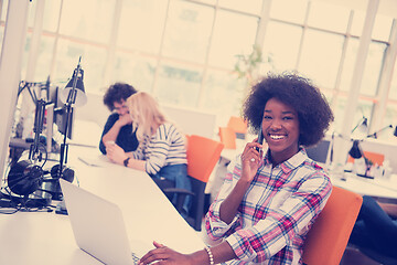 Image showing African American informal business woman working in the office