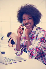 Image showing African American informal business woman working in the office