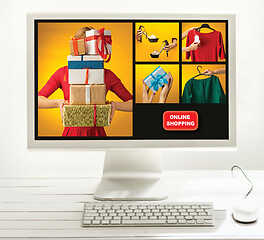 Image showing Internet online shopping concept with computer and cart