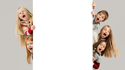 Image showing Banner with a surprised children peeking at the edge