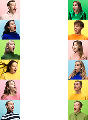 Image showing The woman and man screaming with open mouth isolated on yellow background, concept face emotion