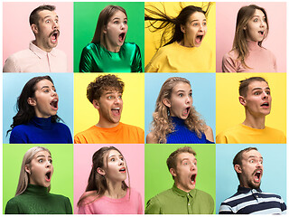 Image showing The woman and man screaming with open mouth isolated on yellow background, concept face emotion