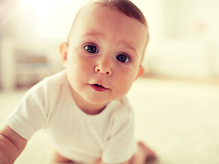 Image showing close up of happy little baby boy or girl at home