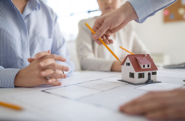 Image showing close up of architects discussing house project