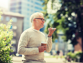 Image showing old man using voice command recorder on smartphone