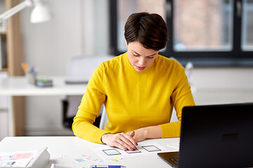 Image showing ui designer working on user interface at office