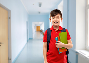 Image showing smiling student boy with books and school bag