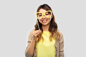 Image showing happy asian woman with big party glasses