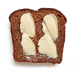 Image showing slice of rye bread with butter