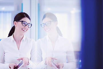 Image showing Business Woman Using Digital Tablet in front of startup Office