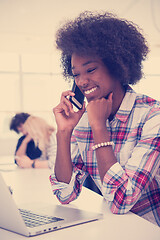 Image showing African American informal business woman working in the office