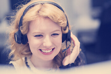 Image showing female call centre operator doing her job