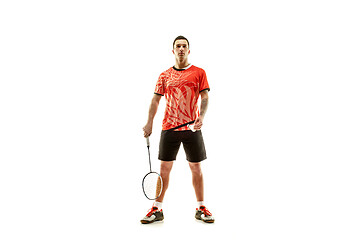Image showing Young male badminton player over white background