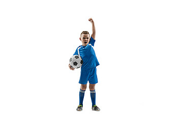 Image showing Young boy with soccer ball doing flying kick