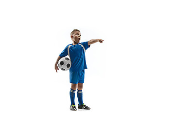 Image showing Young boy with soccer ball doing flying kick