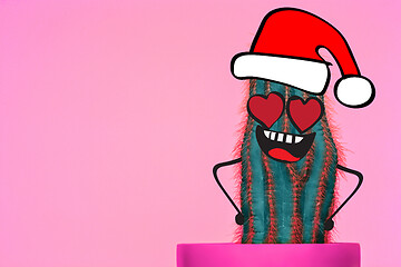 Image showing Cactus hipster man with santa hat. Tropical Christmas concept. Minimal fun art