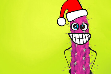 Image showing Cactus hipster man with santa hat. Tropical Christmas concept. Minimal fun art