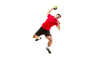 Image showing The one caucasian young man as handball player at studio on white background