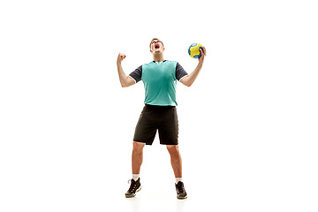 Image showing The one caucasian young man as handball player at studio on white background