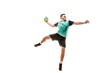 Image showing The one caucasian young man as handball player at studio on white background