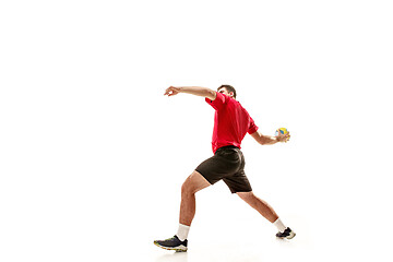 Image showing The one caucasian young man as handball player at studio on white background