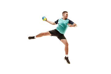 Image showing The one caucasian young man as handball player at studio on white background