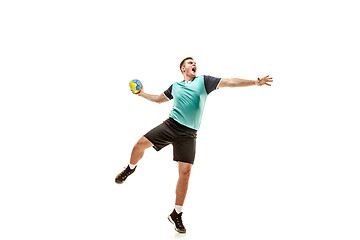 Image showing The one caucasian young man as handball player at studio on white background