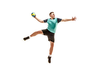 Image showing The one caucasian young man as handball player at studio on white background