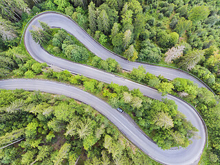 Image showing View from above of a forest curvy road