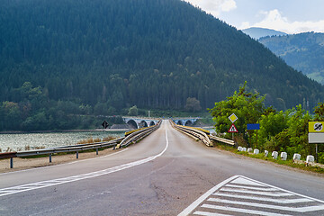 Image showing Crossing bridge road on mountain valley