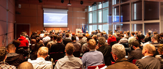 Image showing Speaker giving presentation on business conference meeting.