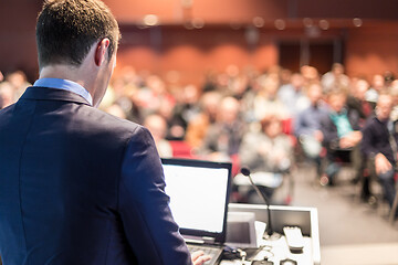 Image showing Speaker giving a talk at business conference meeting.