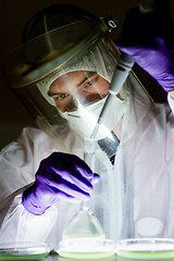 Image showing Scientist working in corona virus vaccine development laboratory research facility.