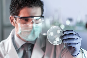 Image showing Scientist working in corona virus vaccine development laboratory research facility.