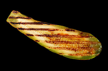 Image showing Piece of grilled zucchini on black
