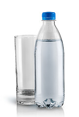 Image showing Empty glass and plastic bottle