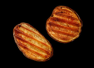 Image showing Two slices of grilled potatoes