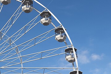 Image showing White ferris wheel against blus sunny sky
