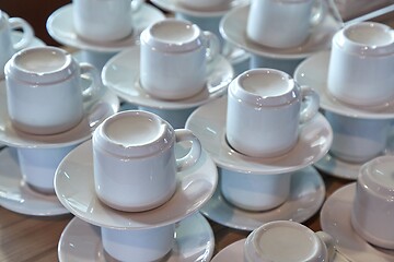 Image showing Clean coffee cups piled up