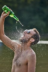 Image showing Man drinking like crazy