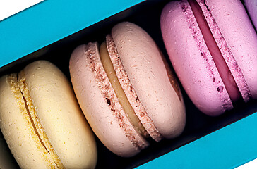 Image showing Three macaroons in box closeup