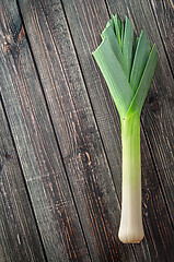 Image showing Leek on a wooden background