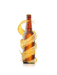 Image showing Spiral beer\'s splash around brown bottle on a white background.