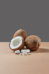 Image showing Fruit set from natural exotic coconuts on a duotone background.